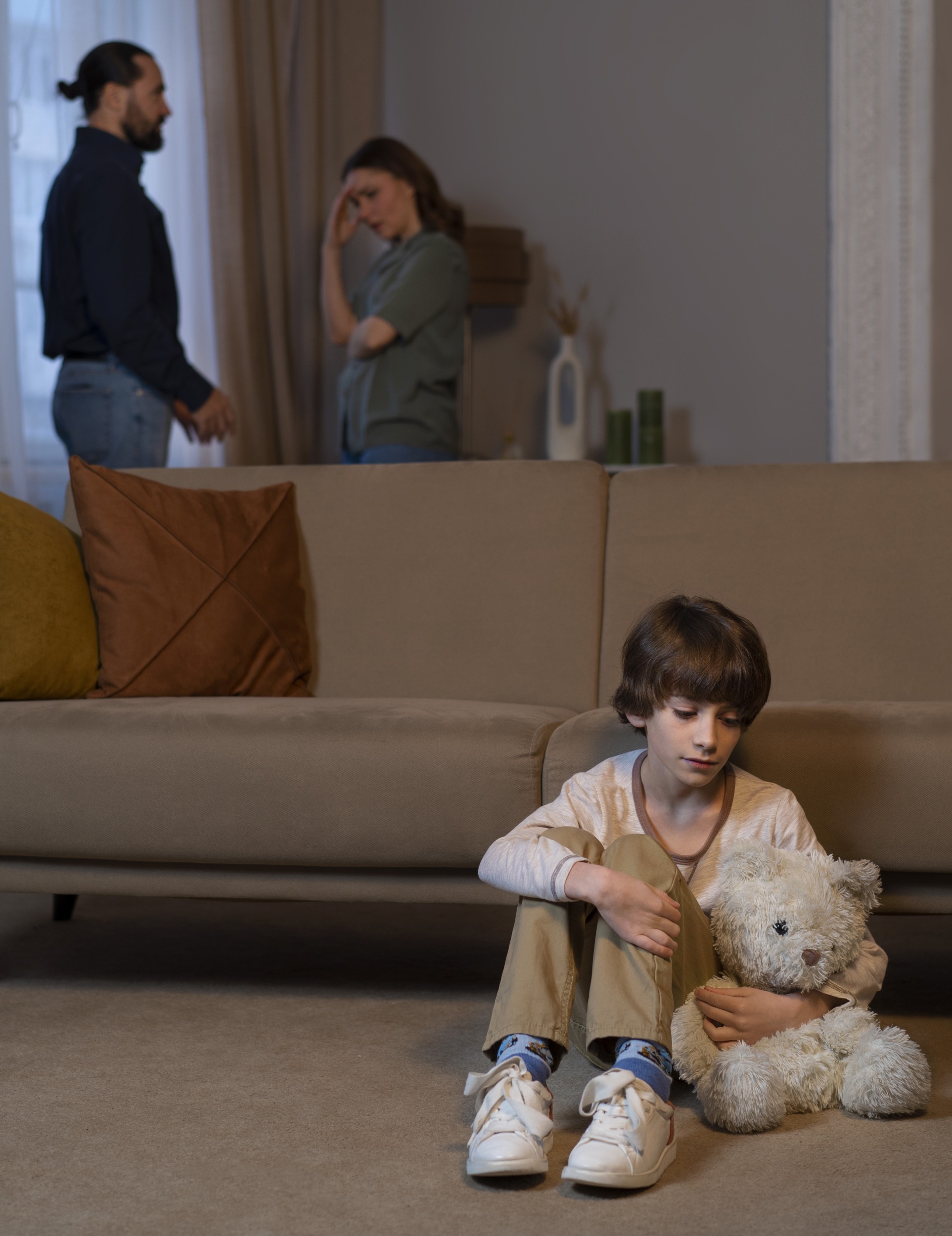 young-child-suffering-from-abuse-by-parents-fighting-home.jpg