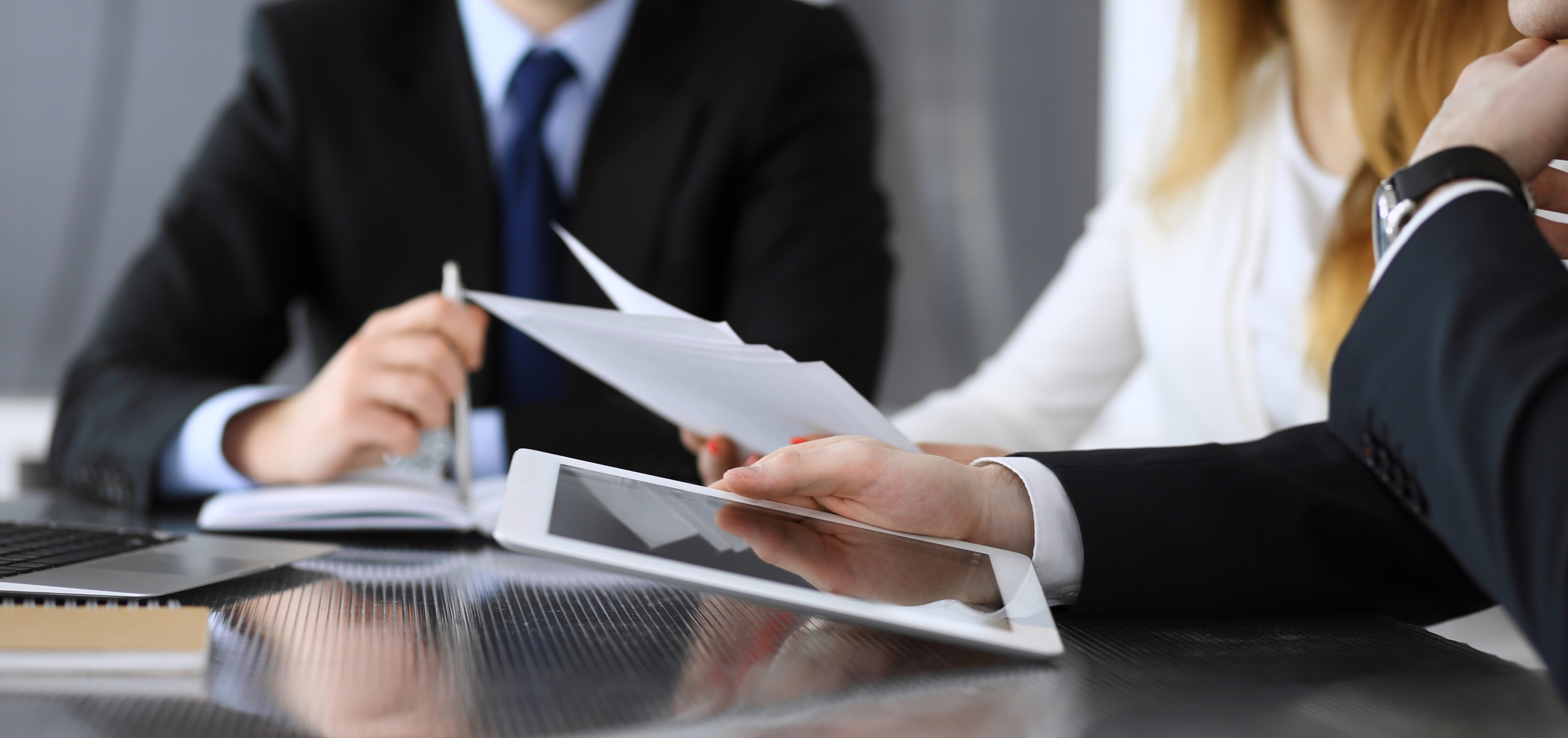 business-people-lawyers-discussing-questions-contract-meeting-modern-office-closeup.jpg