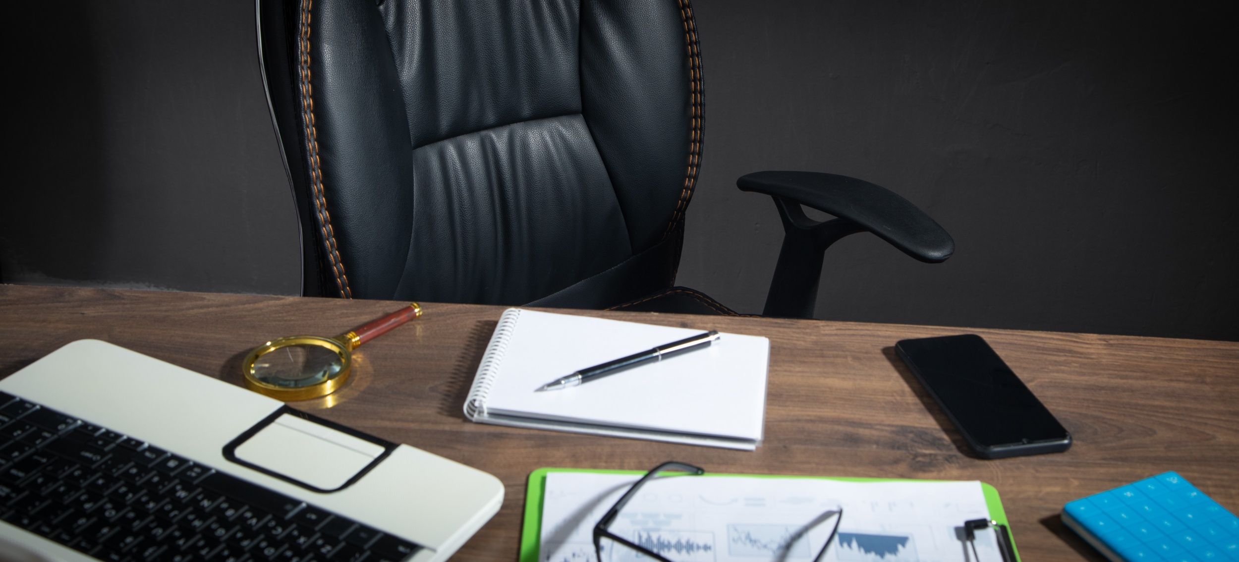 focus-black-leather-chair-with-office-workplace.jpg