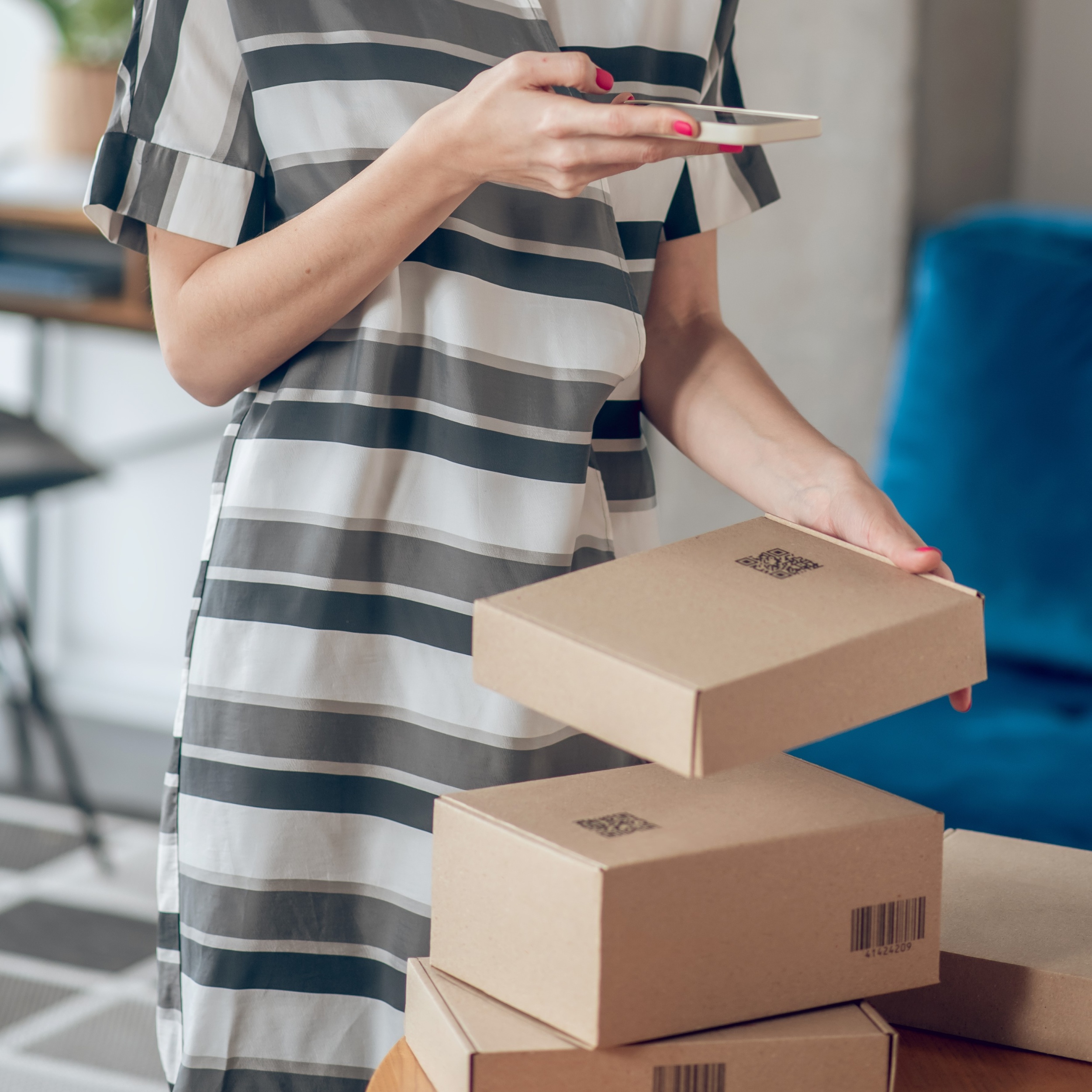 4 focused-woman-scanning-qr-code-package.jpg