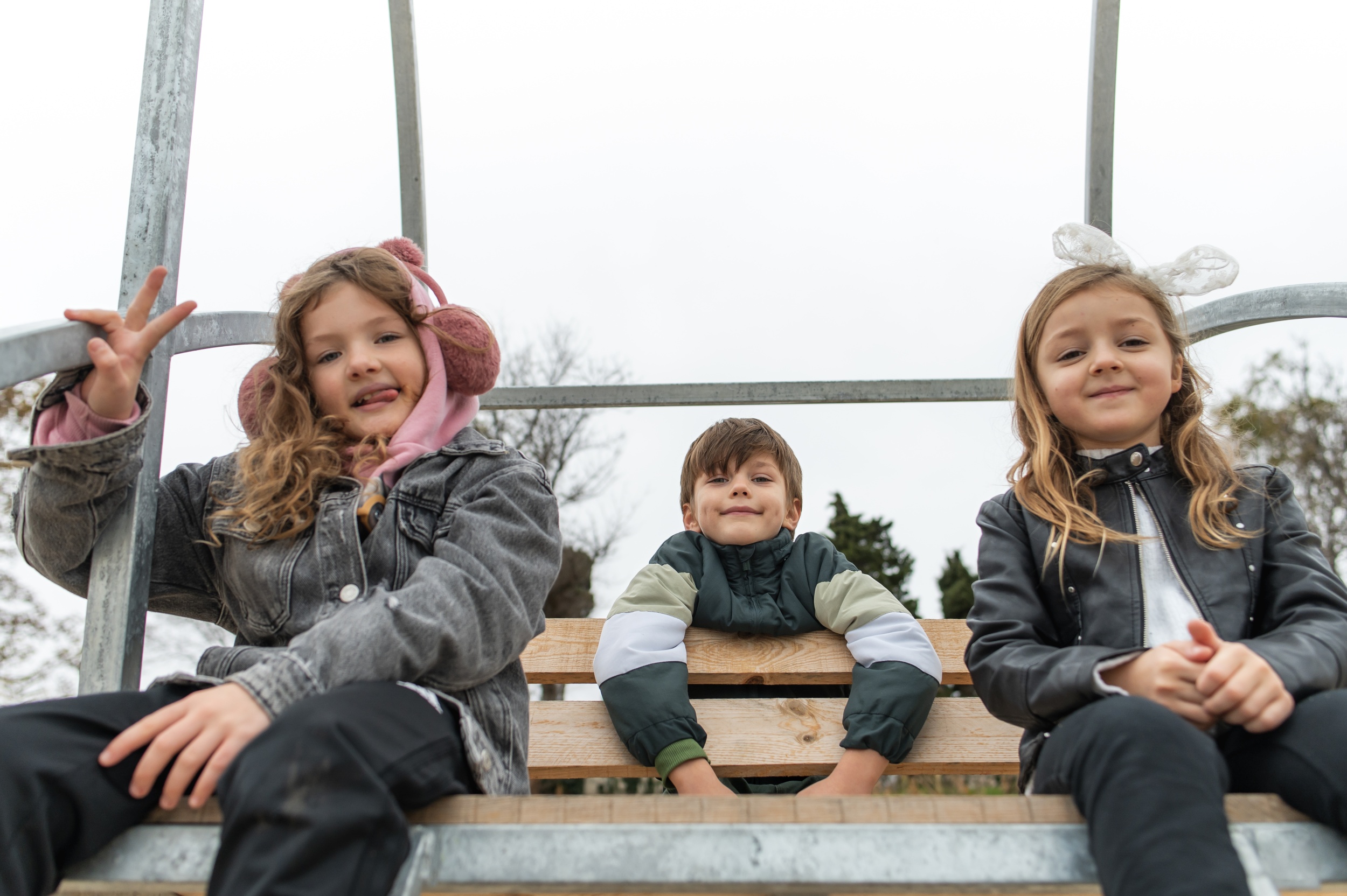4 children-having-fun-together-by-sea.jpg