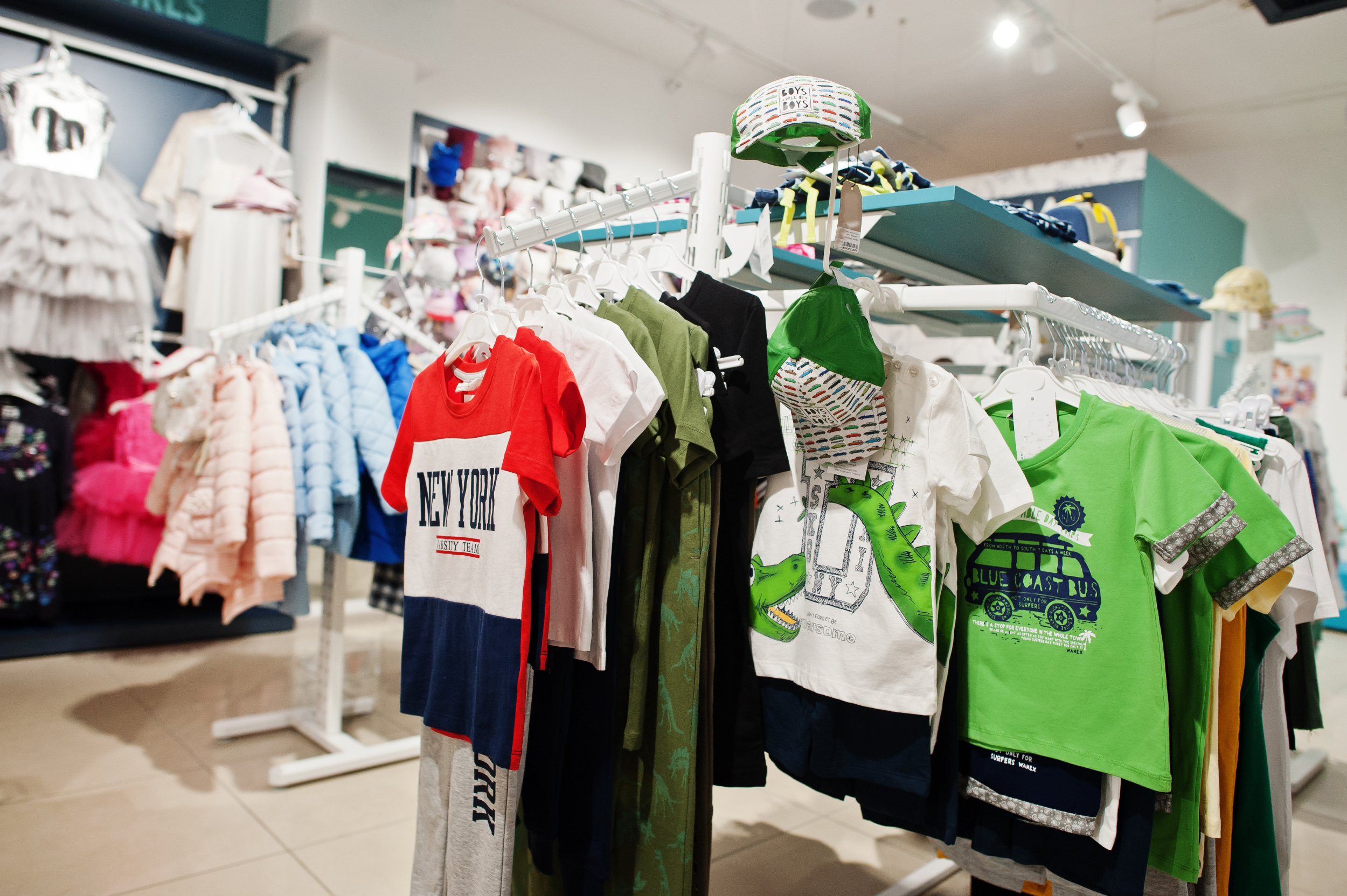 3 children-s-bright-clothes-hang-display-baby-clothing-store-boys-section.jpg