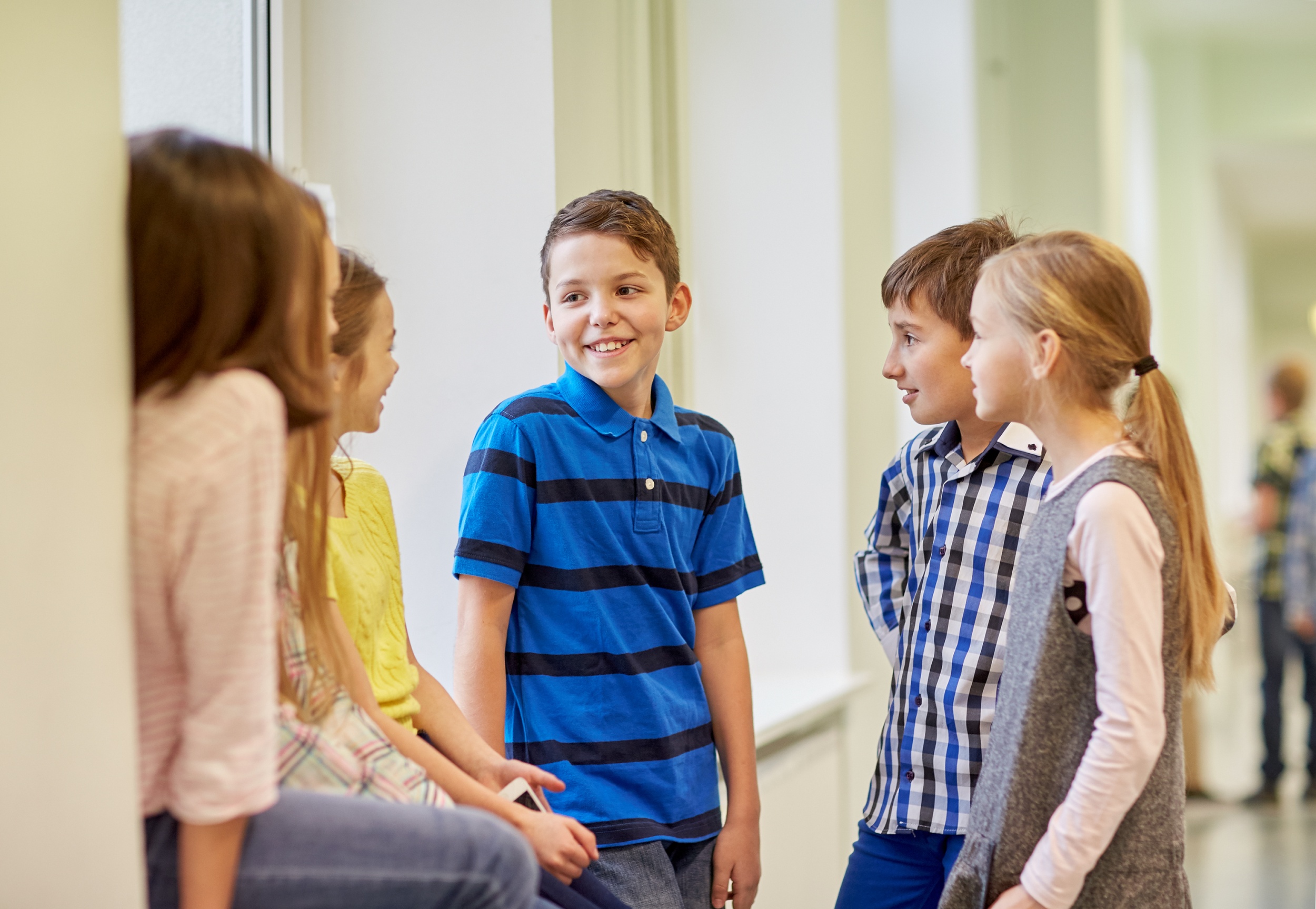 3 education-elementary-school-children-break-people-concept-group-smiling-school-kids-talking-corridor.jpg